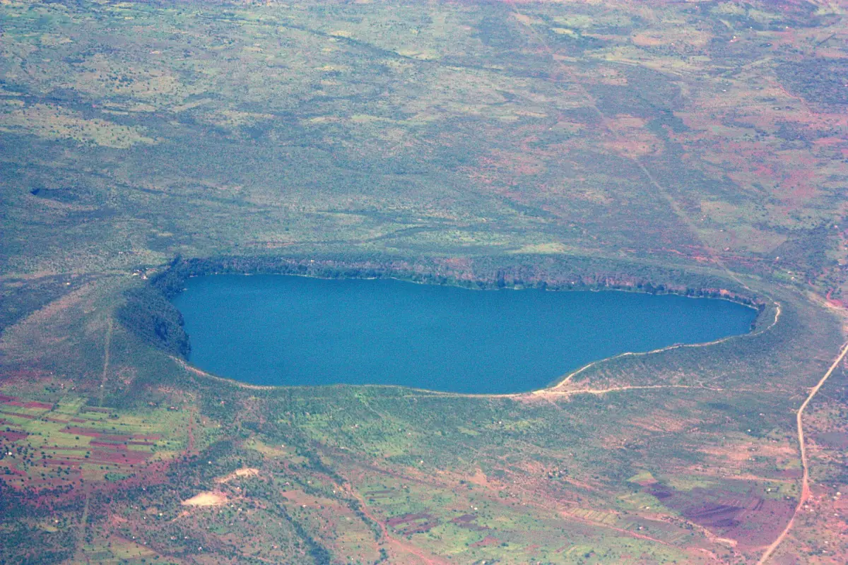 Aerial view of the blue crater lake Lake Chala inside its rim