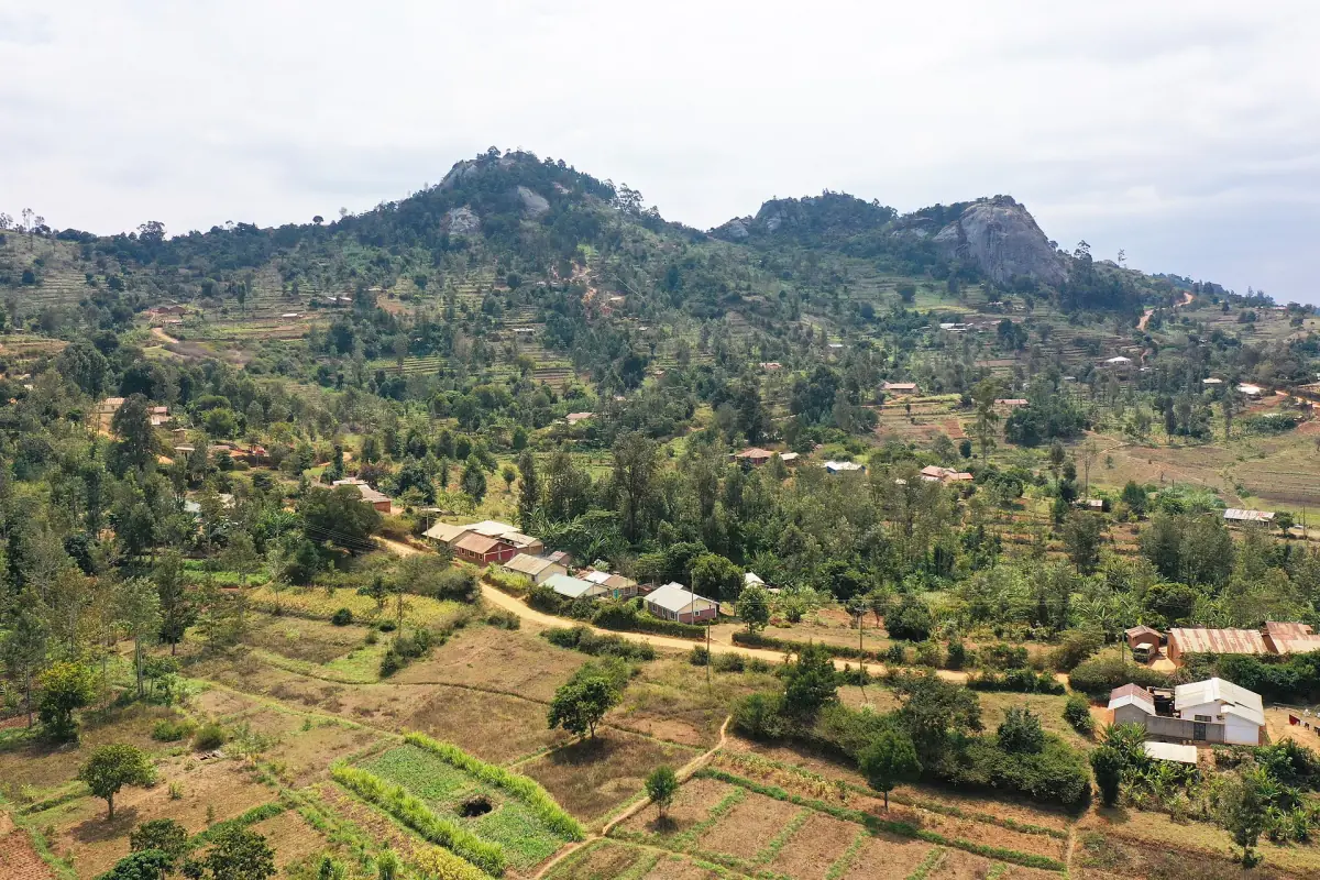 Rocky hill above houses and small farm plots in the Taita Hills